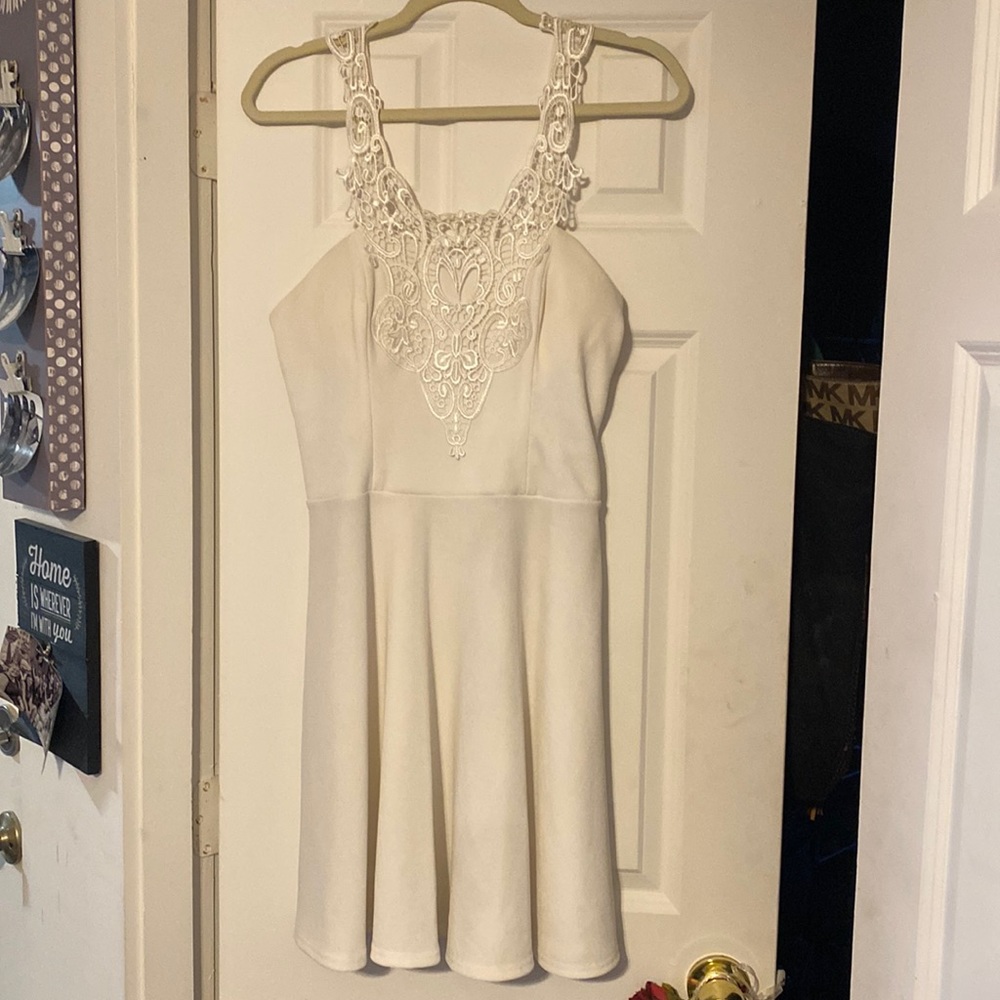 Mini white dress with lace straps